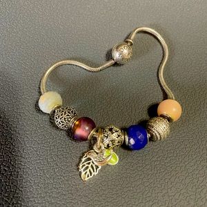 Pandora small bracelet with charms.